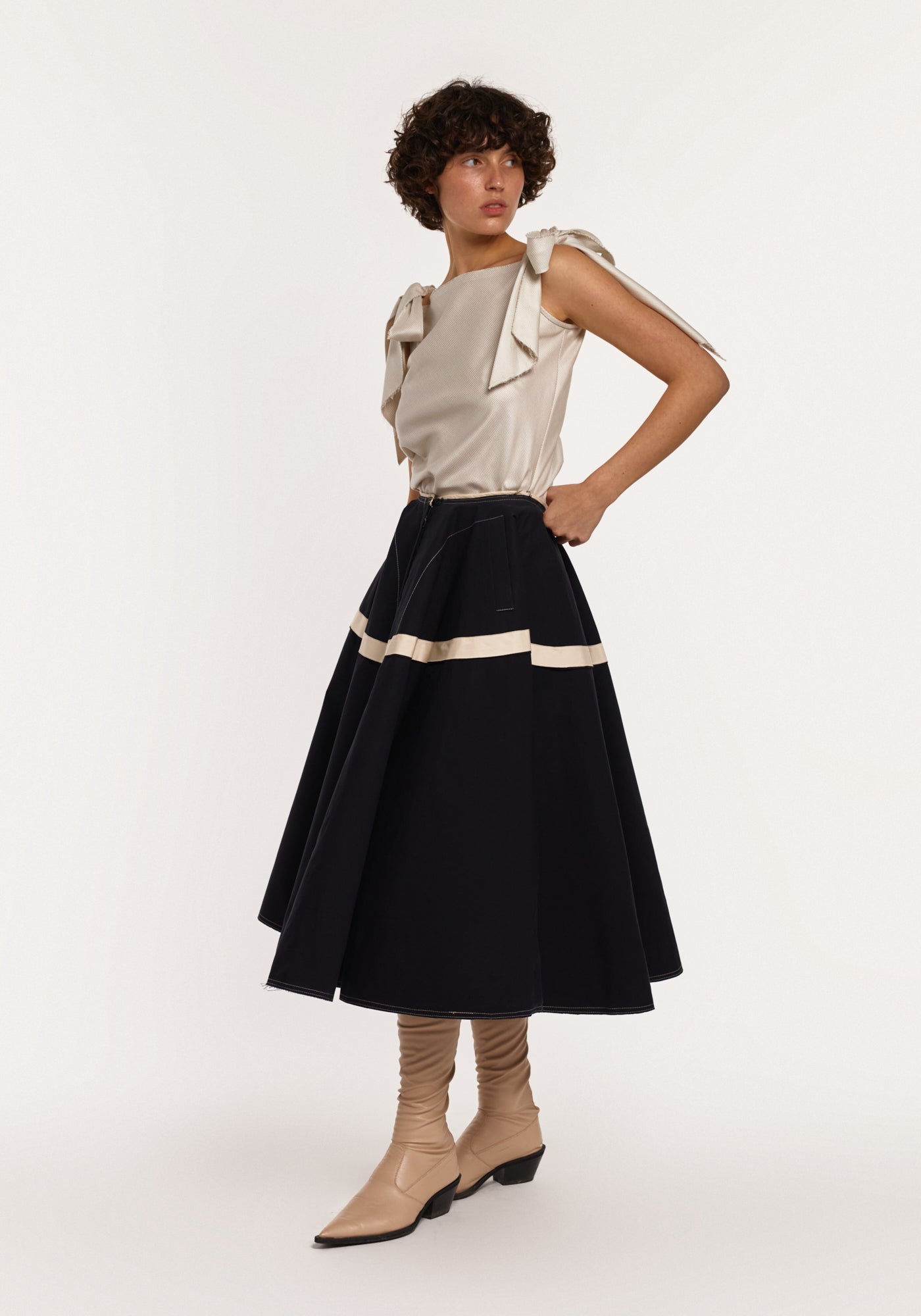 Light-green silk top with bows