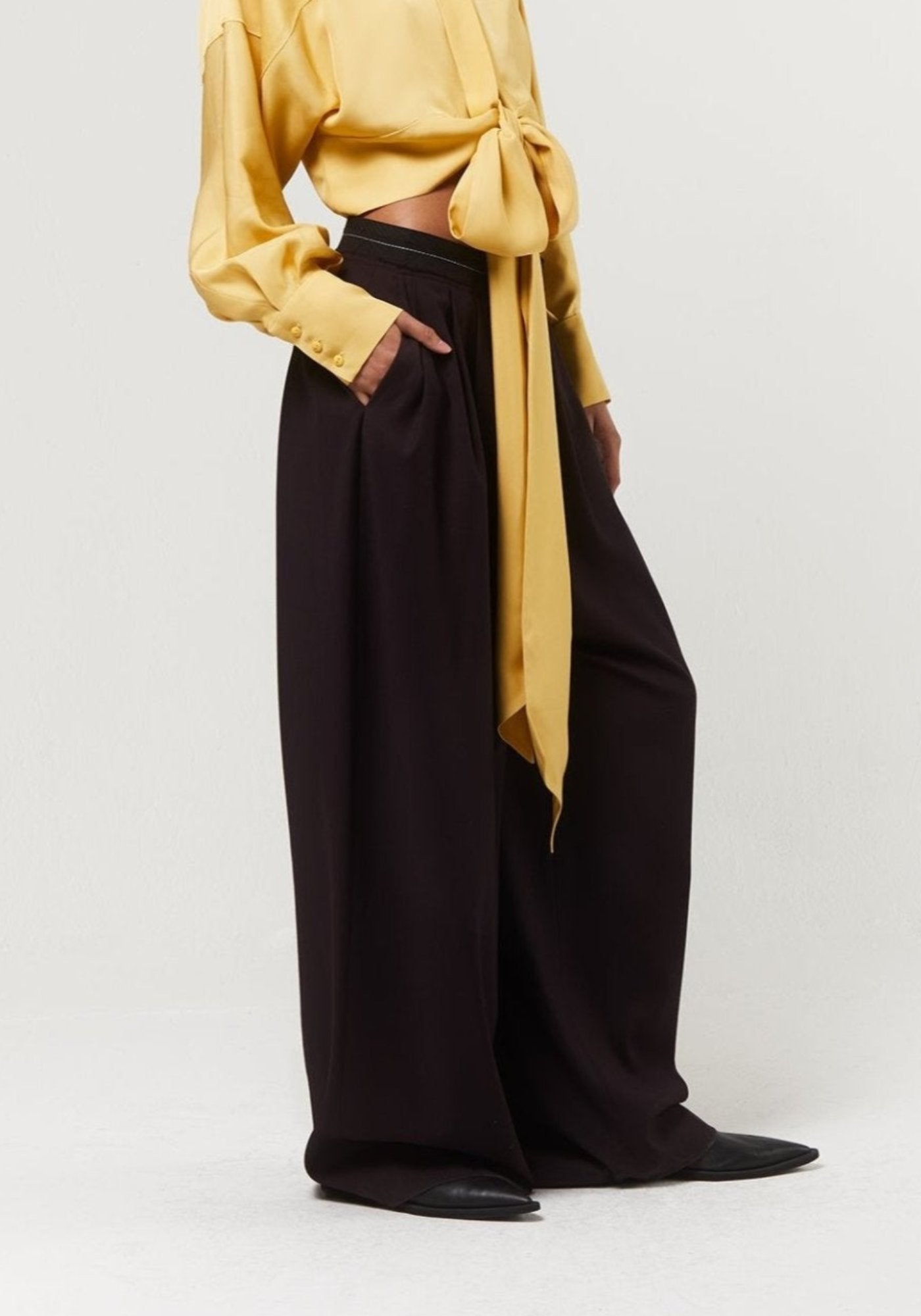 Брюки баклажанового кольору