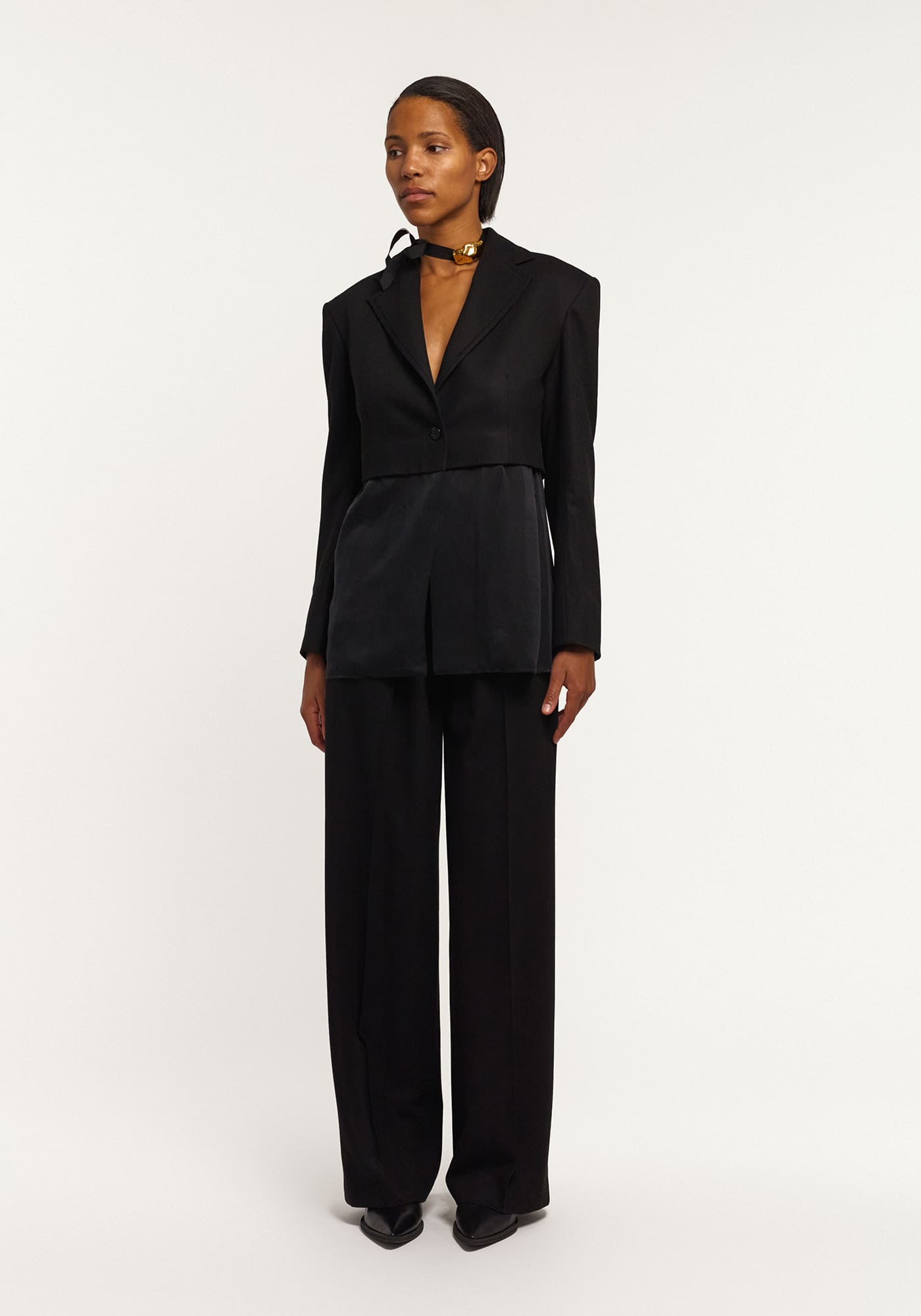 Чорні брюки із шовковою кокеткою