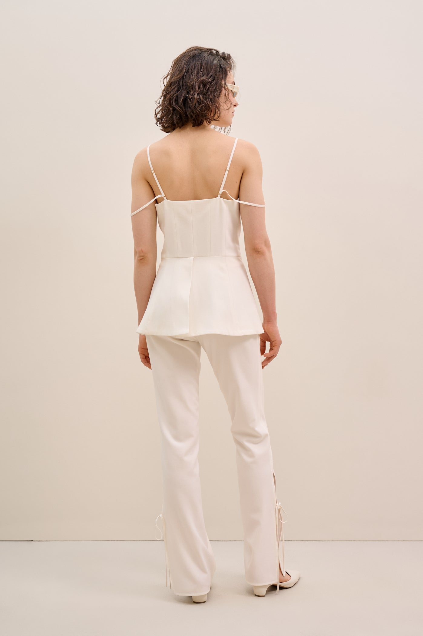 Narrowed white trousers