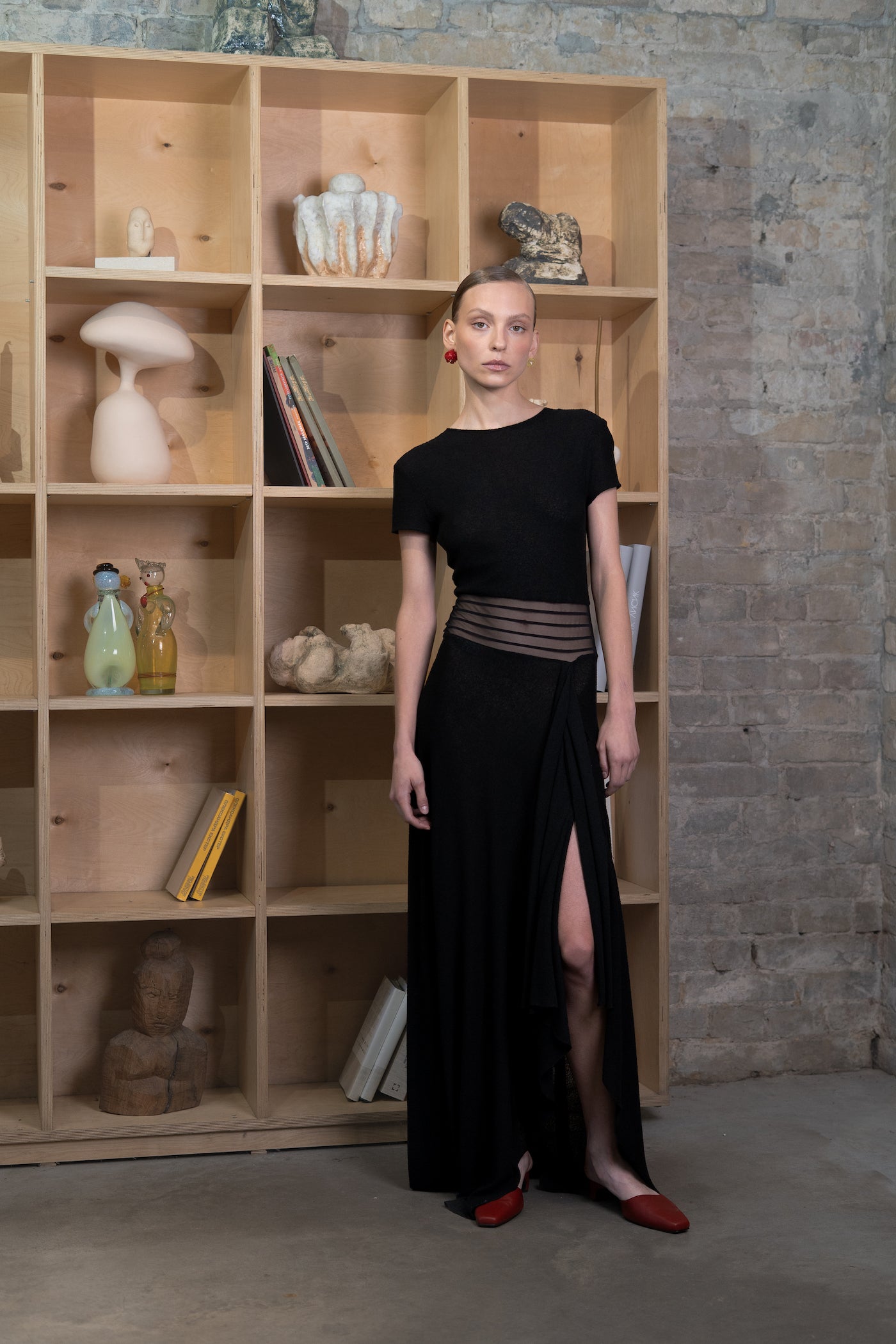 Knitted black dress with sheer ribbons