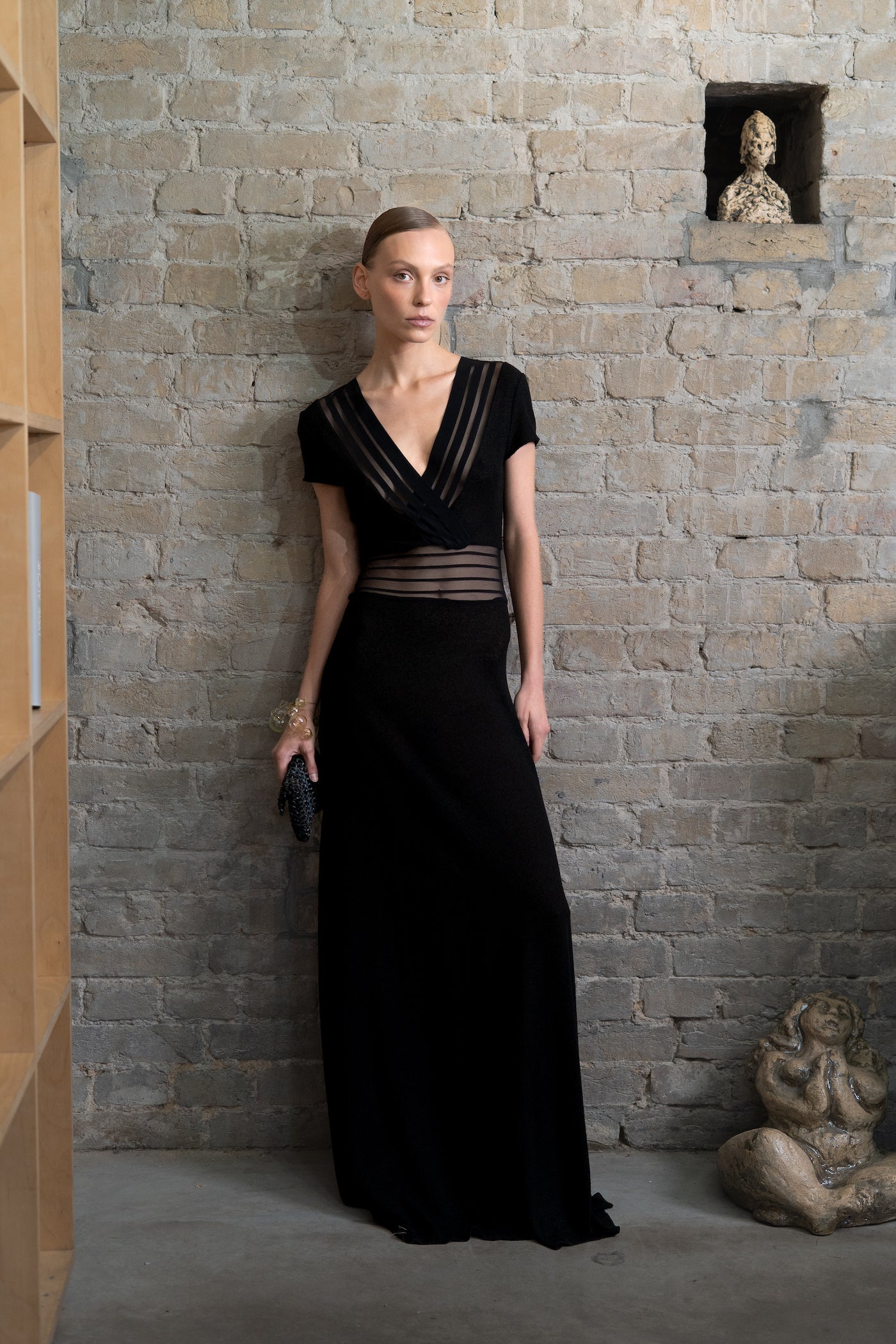 Knitted black dress with sheer ribbons