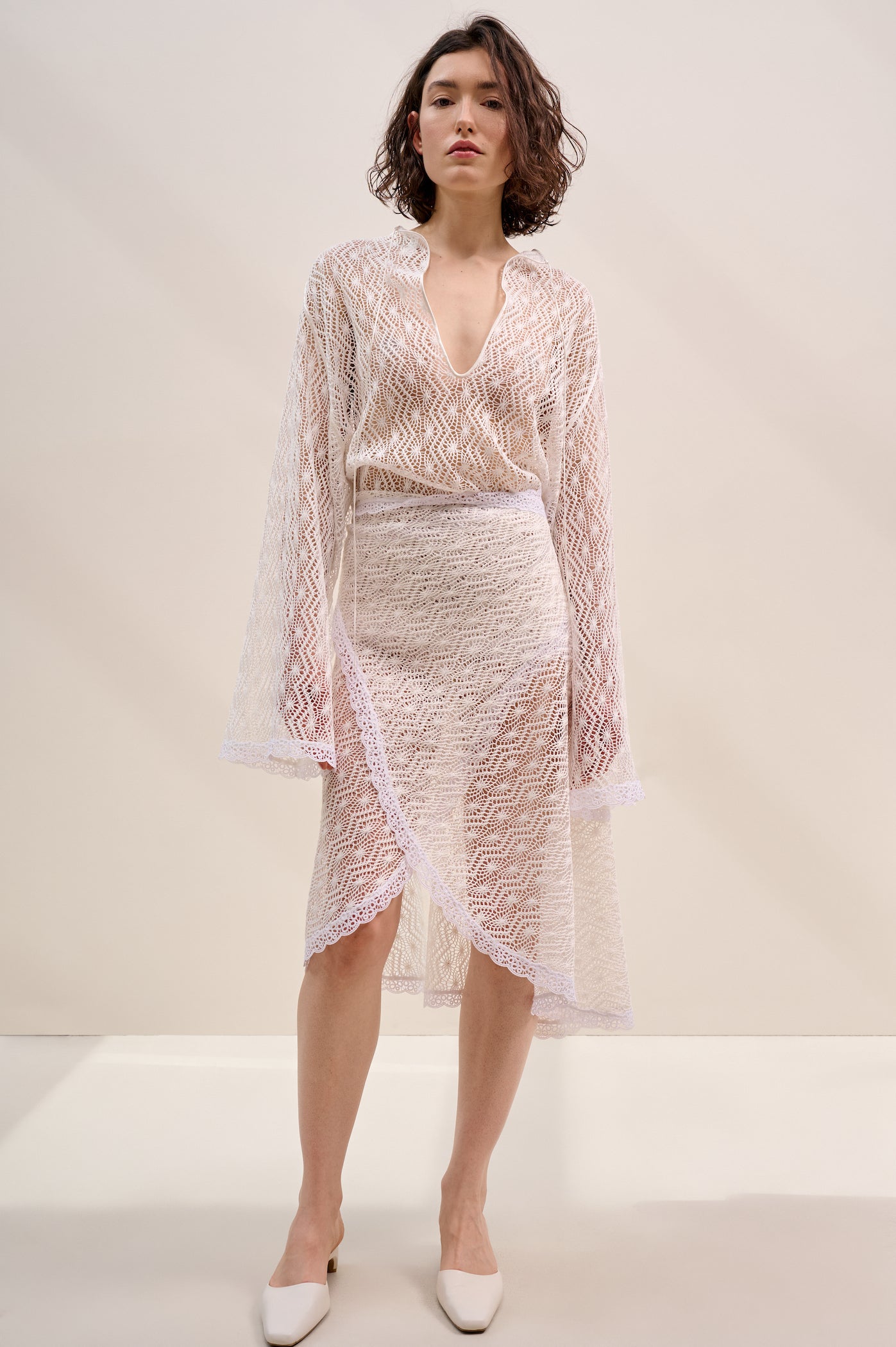 Openwork cape/skirt